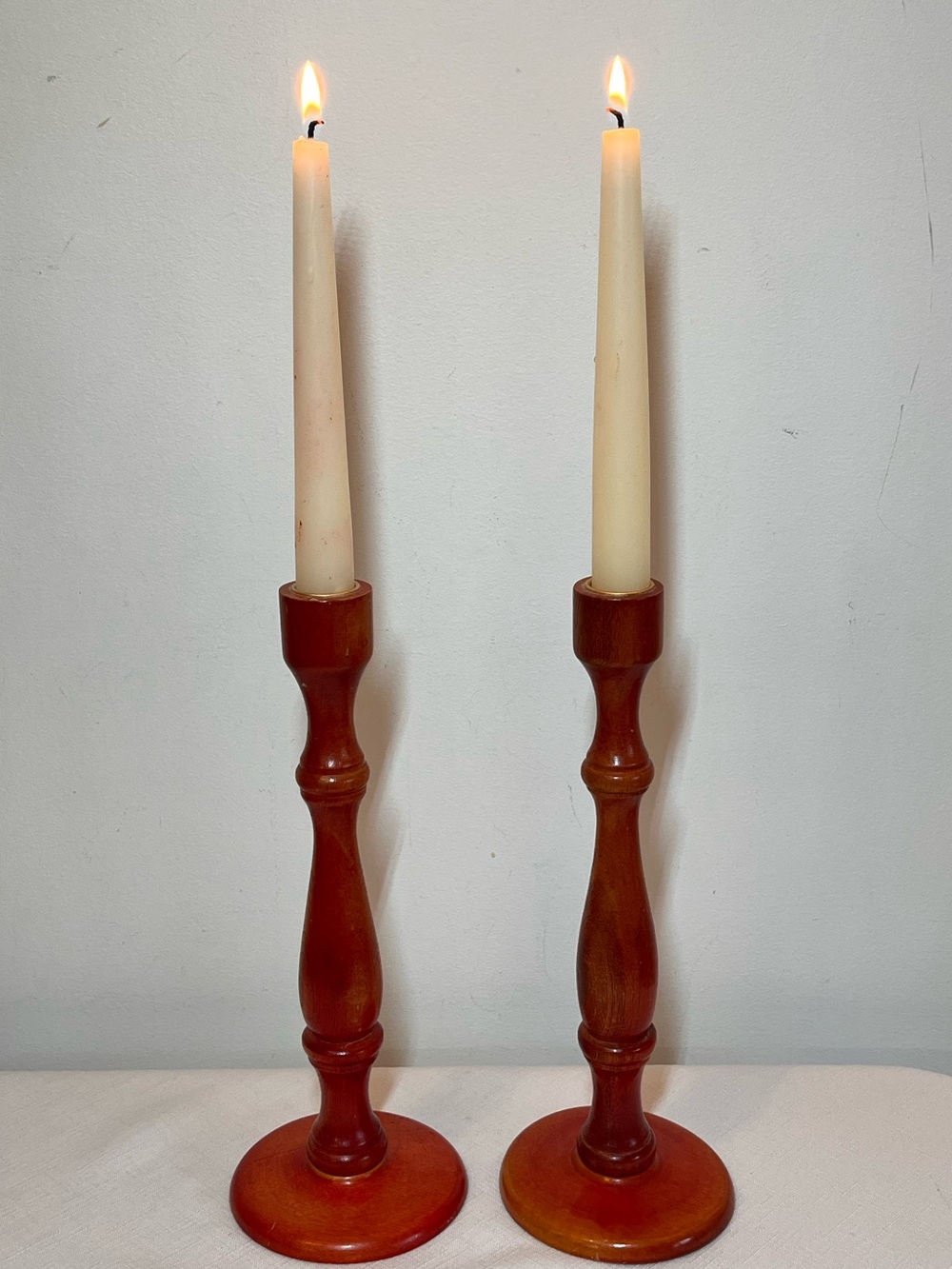 Vintage Classic Tall Wooden Turned Candlesticks Pair in Warm Red Brown. 11.25”
